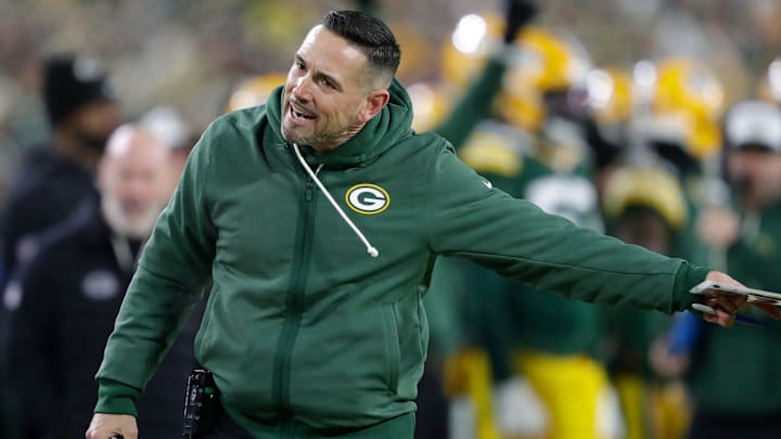 Green Bay Packers' Matt Lafleur talks to an official against the Baltimore Ravens during their football game Saturday, December 27, 2025, at Lambeau Field in Green Bay, Wisconsin.