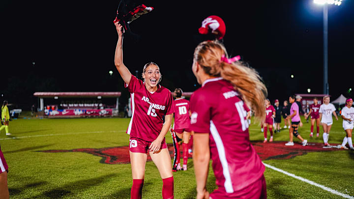 Arkansas soccer players celebrate against Alabama last week. Arkansas soccer players celebrate against Alabama last week.