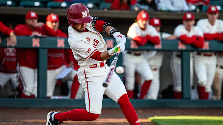 Cayden Brumbaugh makes contact on pitch for a double. 