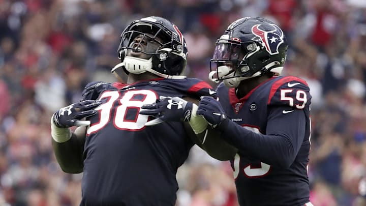 Oct 6, 2019; Houston, TX, USA; Houston Texans defensive end D.J. Reader (98) celebrates with outside linebacker Whitney Mercilus (59) during the second half against the Atlanta Falcons at NRG Stadium. Mandatory Credit: Kevin Jairaj-Imagn Images Oct 6, 2019; Houston, TX, USA; Houston Texans defensive end D.J. Reader (98) celebrates with outside linebacker Whitney Mercilus (59) during the second half against the Atlanta Falcons at NRG Stadium. Mandatory Credit: Kevin Jairaj-Imagn Images