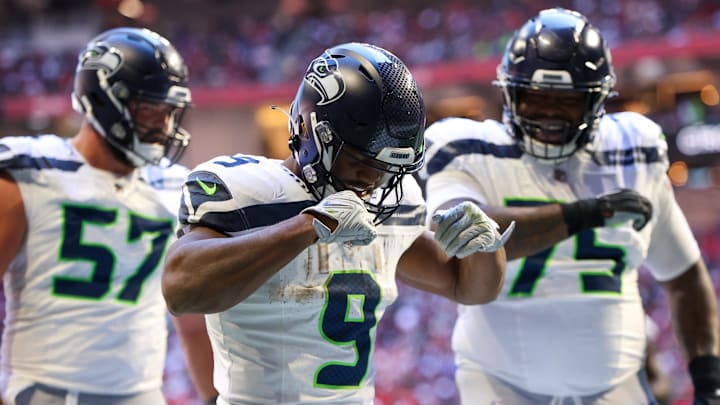 Oct 20, 2024; Atlanta, Georgia, USA; Seattle Seahawks running back Kenneth Walker III (9) celebrates after a touchdown catch against the Atlanta Falcons in the third quarter at Mercedes-Benz Stadium.