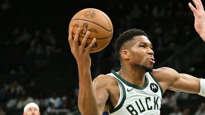 Milwaukee Bucks forward Giannis Antetokounmpo drives the ball towards the basket.