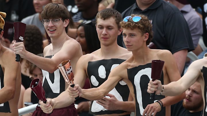 Mississippi State Bulldogs fans ring their cowbells during warm ups prior to the game against the Arizona State Sun Devils at Davis Wade Stadium at Scott Field. Mississippi State Bulldogs fans ring their cowbells during warm ups prior to the game against the Arizona State Sun Devils at Davis Wade Stadium at Scott Field.