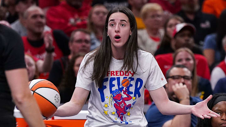 Indiana Fever guard Caitlin Clark (22) reacts to a call from the referee Tuesday, Aug. 12, 2025, during the game at Gainbridge Fieldhouse in Indianapolis. The Dallas Wings defeated the Indiana Fever, 81-80.