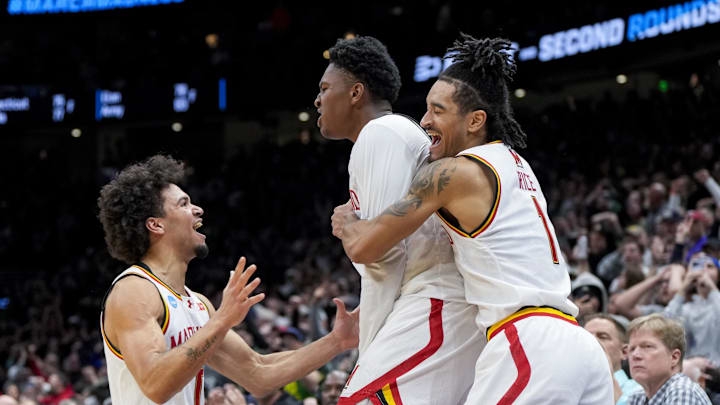 Maryland Terrapins center Derik Queen is mobbed by teammates after hitting the game winner vs. Colorado State. Maryland Terrapins center Derik Queen is mobbed by teammates after hitting the game winner vs. Colorado State.