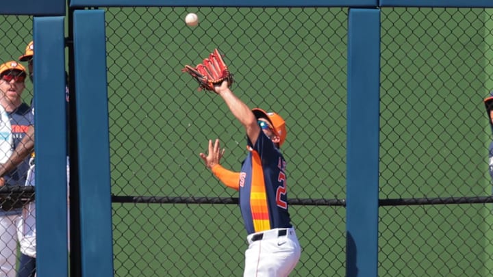 Mar 2, 2025; West Palm Beach, Florida, USA; Houston Astros second baseman Jose Altuve (27) catches a fly ball and retires Washington Nationals catcher Keibert Ruiz (not pictured) during the third inning at CACTI Park of the Palm Beaches. Mar 2, 2025; West Palm Beach, Florida, USA; Houston Astros second baseman Jose Altuve (27) catches a fly ball and retires Washington Nationals catcher Keibert Ruiz (not pictured) during the third inning at CACTI Park of the Palm Beaches.