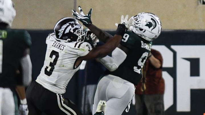 MSU TE Daniel Barker tries to snag a pass against Western Michigan LB Zaire Barnes Friday, Sept. 2, 2022, during the season opener at Spartan Stadium.
Dsc 7069 MSU TE Daniel Barker tries to snag a pass against Western Michigan LB Zaire Barnes Friday, Sept. 2, 2022, during the season opener at Spartan Stadium.
Dsc 7069