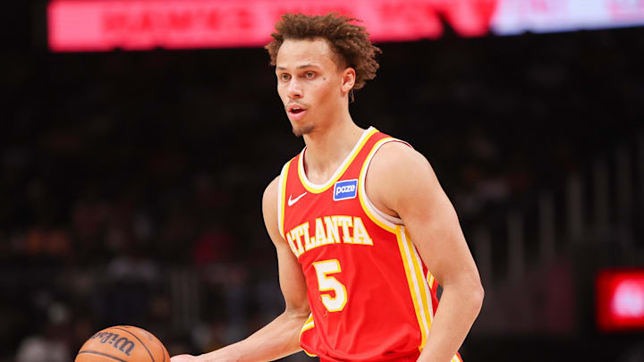 Mar 14, 2026; Atlanta, Georgia, USA; Atlanta Hawks guard Dyson Daniels (5) dribbles against the Milwaukee Bucks in the third quarter at State Farm Arena. Mandatory Credit: Brett Davis-Imagn Images