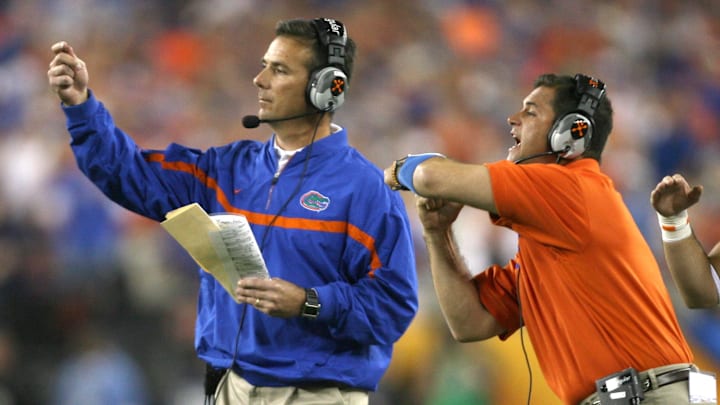 Florida Gators head coach Urban Meyer won two national titles with now-interim head coach Billy Gonzales as an offensive assistant. Florida Gators head coach Urban Meyer won two national titles with now-interim head coach Billy Gonzales as an offensive assistant.