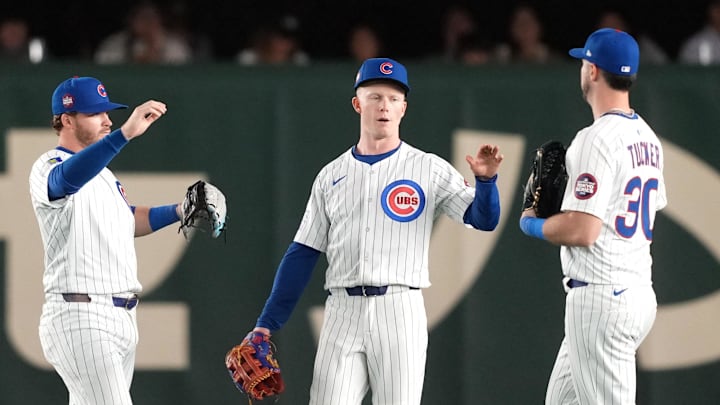 Mar 16, 2025; Bunkyo, Tokyo, Japan; Chicago Cubs center fielder Pete Crow-Armstrong (center) celebrates with right fielder Kyle Tucker (30) and left fielder Ian Happ (left) after defeating the Yomiuri Giants at Tokyo Dome. Mar 16, 2025; Bunkyo, Tokyo, Japan; Chicago Cubs center fielder Pete Crow-Armstrong (center) celebrates with right fielder Kyle Tucker (30) and left fielder Ian Happ (left) after defeating the Yomiuri Giants at Tokyo Dome.