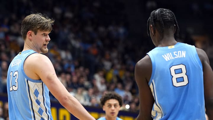 Jan 17, 2026; Berkeley, California, USA; North Carolina Tar Heels center Henri Veesaar (13) and forward Caleb Wilson (8) slap hands during the second half against the California Golden Bears at Haas Pavilion. Mandatory Credit: Darren Yamashita-Imagn Images