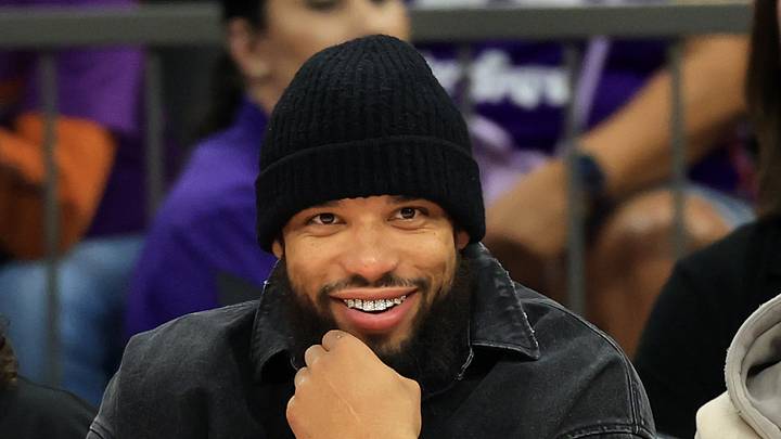 Phoenix, Arizona, USA; Phoenix Suns forward Dillon Brooks smiles as he sits courtside of the Phoenix Mercury game against the Minnesota Lynx in the second half at Mortgage Matchup Center on May 12, 2026. Phoenix, Arizona, USA; Phoenix Suns forward Dillon Brooks smiles as he sits courtside of the Phoenix Mercury game against the Minnesota Lynx in the second half at Mortgage Matchup Center on May 12, 2026.