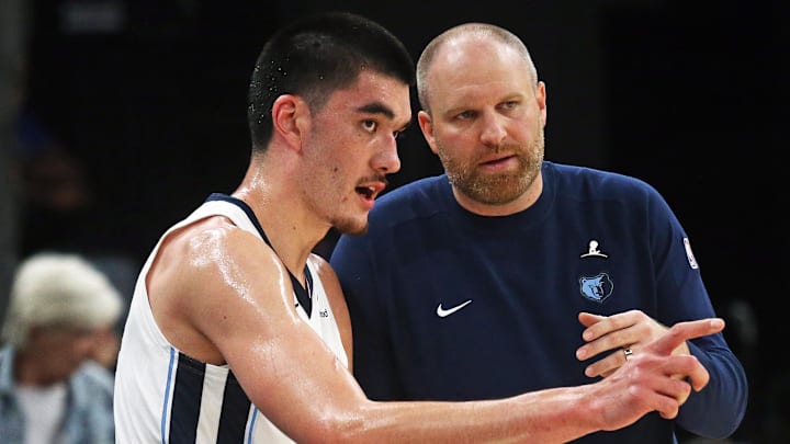 Oct 10, 2024; Memphis, Tennessee, USA; Memphis Grizzlies center Zach Edey (14) talks with head coach Taylor Jenkins during the second half against the Charlotte Hornets at FedExForum. Mandatory Credit: Petre Thomas-Imagn Images