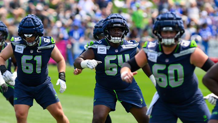 Jul 27, 2024; Renton, WA, USA; Seattle Seahawks guard Christian Haynes (64) during training camp at Virginia Mason Athletic Center.