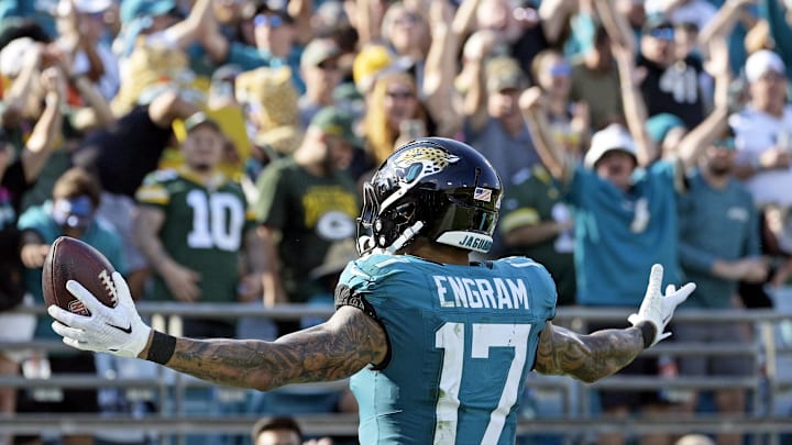 Oct 27, 2024; Jacksonville, Florida, USA; Jacksonville Jaguars tight end Evan Engram (17) catches a touchdown pass during the fourth quarter against the Green Bay Packers at EverBank Stadium. Mandatory Credit: Melina Myers-Imagn Images