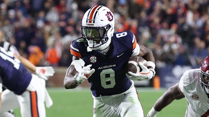 Auburn Tigers wide receiver Cam Coleman carries the ball during the second half against the Alabama Crimson Tide at Jordan-Hare Stadium. 