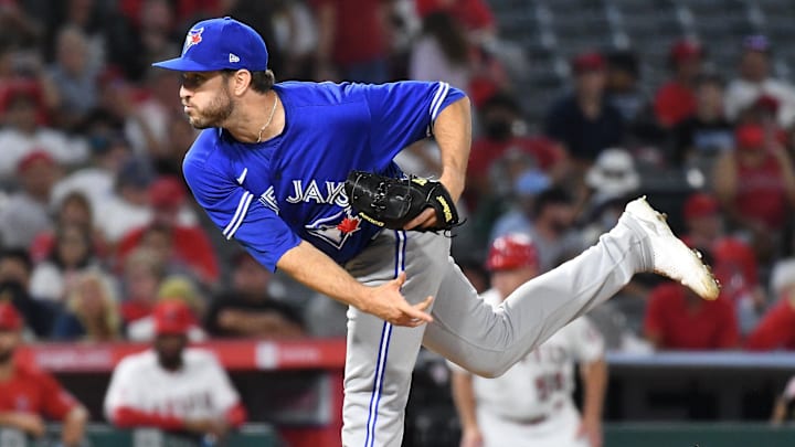 Aug 12, 2021; Anaheim, California, USA; Toronto Blue Jays relief pitcher Connor Overton (44) works the mound in the eighth inning against the Los Angeles Angels at Angel Stadium