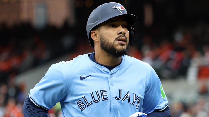 Apr 12, 2025; Baltimore, Maryland, USA; Toronto Blue Jays outfielder Anthony Santander (25) runs off of the field during the eighth inning against the Baltimore Orioles at Oriole Park at Camden Yards