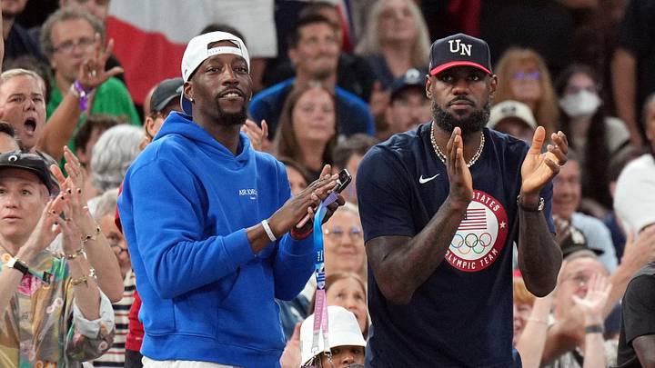 Aug 11, 2024; Paris, France;  Bam Adebayo and LeBron James react in the second half between the United States and France in the women's gold medal game during the Paris 2024 Olympic Summer Games at Accor Arena. Mandatory Credit: James Lang-Imagn Images