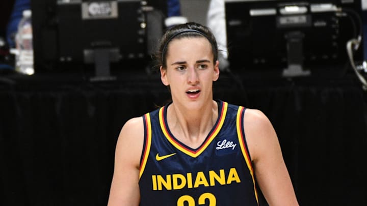 Caitlin Clark (22) looks on