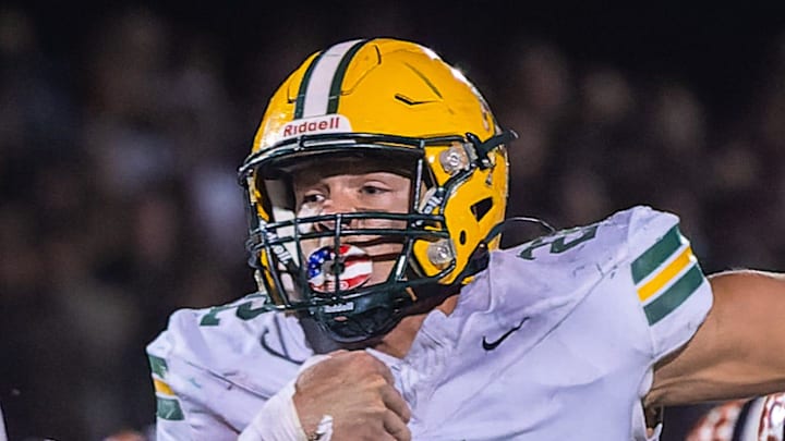 Howell's Bryce Kish (22) breaks away from the Brighton defense for a touchdown Friday, Oct. 17, 2025. Howell's Bryce Kish (22) breaks away from the Brighton defense for a touchdown Friday, Oct. 17, 2025.