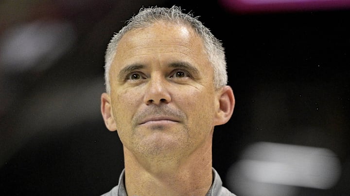 Mar 9, 2024; Tallahassee, Florida, USA; Florida State Seminoles head football coach Mike Norvell accepts the Bear Bryant coach of the Year award during a media timeout of a basketball game against the Miami Hurricanes at Donald L. Tucker Center. Mandatory Credit: Melina Myers-Imagn Images