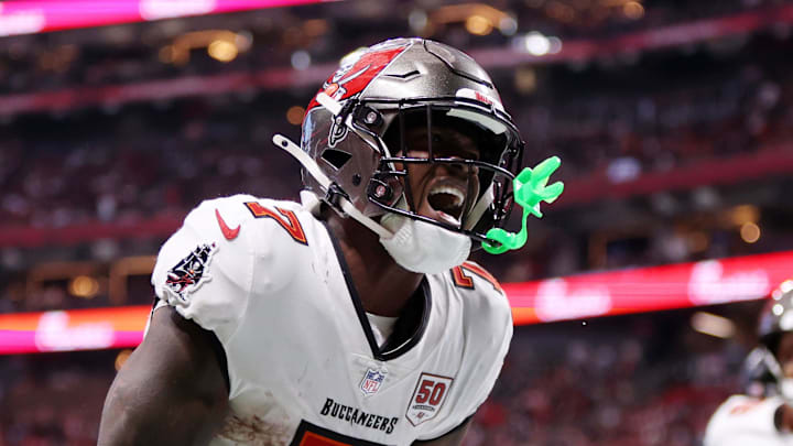 Tampa Bay Buccaneers running back Bucky Irving (7) celebrates after scoring a touchdown against the Atlanta Falcons 