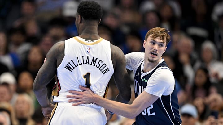 Nov 21, 2025; Dallas, Texas, USA; New Orleans Pelicans forward Zion Williamson (1) and Dallas Mavericks forward Cooper Flagg (32) look for the ball during the second half at the American Airlines Center. Mandatory Credit: Jerome Miron-Imagn Images