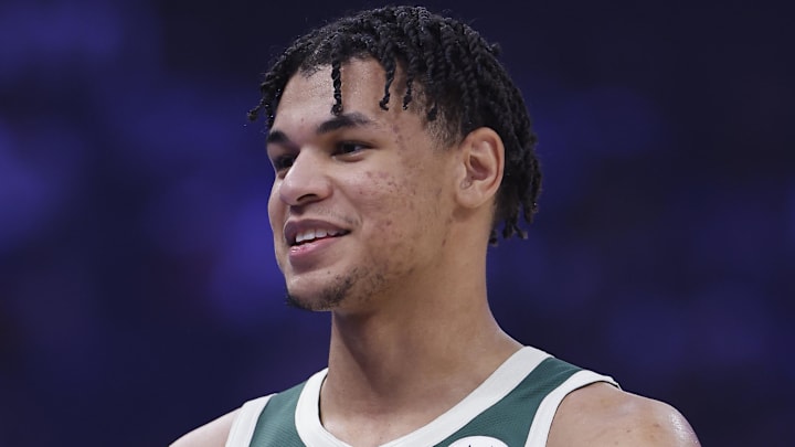 Milwaukee Bucks forward Ousmane Dieng (21) walks onto the court before the start of a game against the Oklahoma City Thunder at Paycom Center on February 12, 2026.