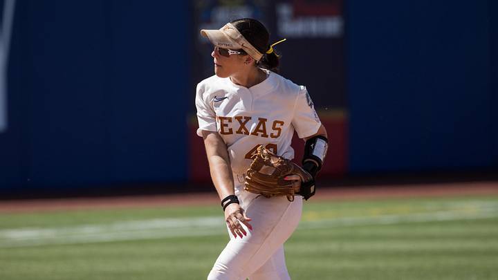 Texas Longhorns utility Leighann Goode (43) throws the ball down and she runs in to celebrate after her team defeated the Nebraska Cornhuskers.