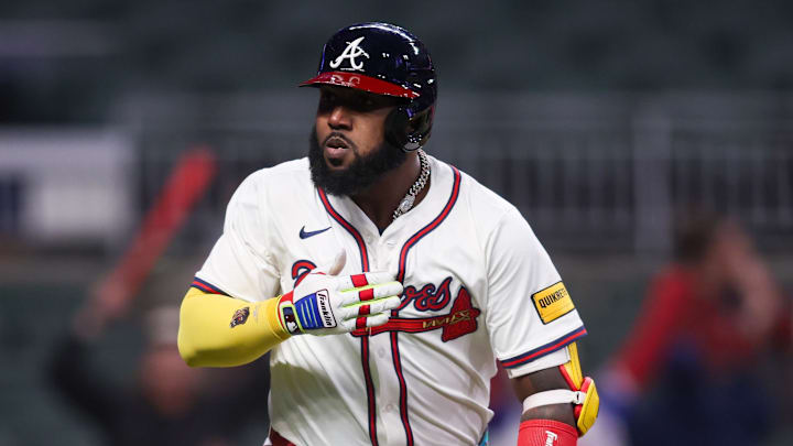 Apr 11, 2025; Atlanta, Georgia, USA; Atlanta Braves designated hitter Marcell Ozuna (20) celebrates after a walk-off two-run home run against the Philadelphia Phillies in the eleventh inning at Truist Park.