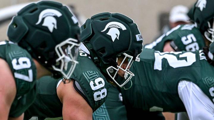 Michigan State's Derrick Simmons, center, lines up with the defense during the football Spring Showcase on Saturday, April 18, 2026, at Spartan Stadium in East Lansing.