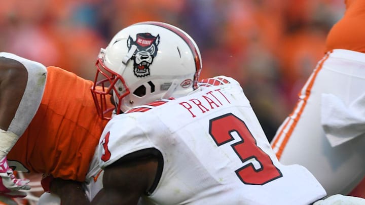 NC State linebacker Germaine Pratt (3) brings down Clemson running back Travis Etienne (9) during the 4th quarter Saturday, October 20, 2018 at Clemson's Memorial Stadium.

Clemson Nc State Football