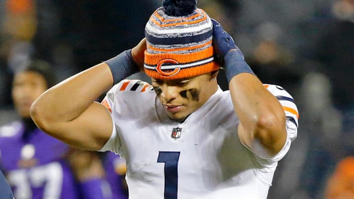 Dec 20, 2021; Chicago, Illinois, USA; Former Chicago Bears quarterback Justin Fields (1) reacts as he walks off the field after their loss to the Minnesota Vikings at Soldier Field. The Minnesota Vikings won 17-9. Ma Dec 20, 2021; Chicago, Illinois, USA; Former Chicago Bears quarterback Justin Fields (1) reacts as he walks off the field after their loss to the Minnesota Vikings at Soldier Field. The Minnesota Vikings won 17-9. Ma
