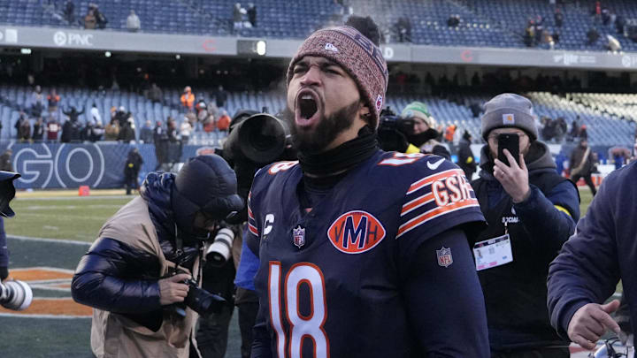 Dec 14, 2025; Chicago, Illinois, USA; Chicago Bears quarterback Caleb Williams (18) celebrates after defeating the Cleveland Browns at Soldier Field. Mandatory Credit: David Banks-Imagn Images