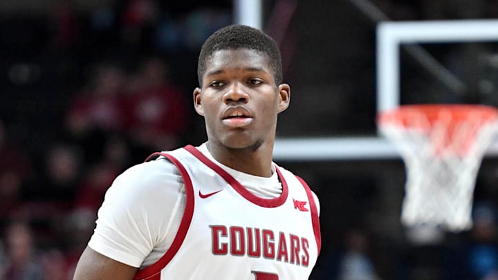 Nov 21, 2024; Spokane, Washington, USA; Washington State Cougars guard Cedric Coward (0) controls the ball against the Eastern Washington Eagles in the second half at Spokane Veterans Memorial Arena. Mandatory Credit: James Snook-Imagn Images