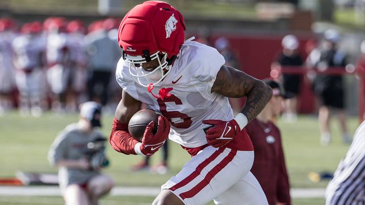 Arkansas Razorbacks wide receiver Chris Marshall (6) runs after a catch during a passing drill during spring practice at the Arkansas Razorbacks practice facilities. Arkansas Razorbacks wide receiver Chris Marshall (6) runs after a catch during a passing drill during spring practice at the Arkansas Razorbacks practice facilities.