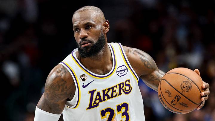 Los Angeles Lakers forward LeBron James (23) controls the ball against the Dallas Mavericks during the second half at American Airlines Center. 