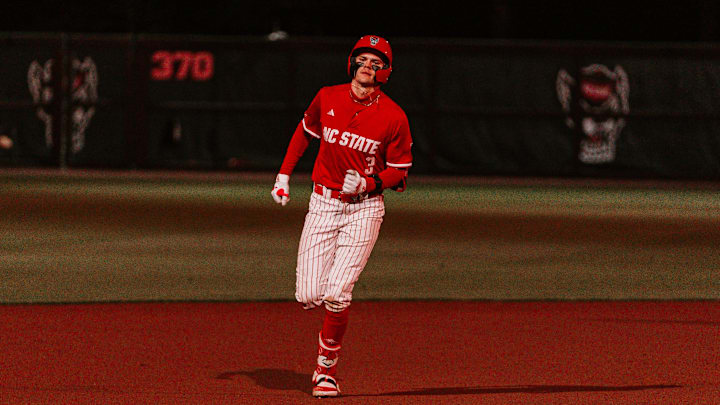 Shortstop Christian Serrano rounds second base after hitting a 3-run home run in NC State's 13-6 victory over Miami in the second leg of a doubleheader on Friday, May 1, 2026. 