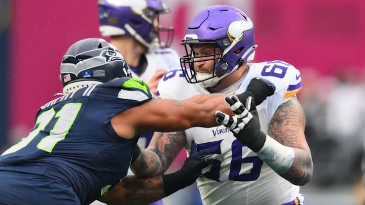 Dec 22, 2024; Seattle, Washington, USA; Minnesota Vikings guard Dalton Risner (66) blocks Seattle Seahawks defensive tackle Byron Murphy II (91) during the first half at Lumen Field. Dec 22, 2024; Seattle, Washington, USA; Minnesota Vikings guard Dalton Risner (66) blocks Seattle Seahawks defensive tackle Byron Murphy II (91) during the first half at Lumen Field.