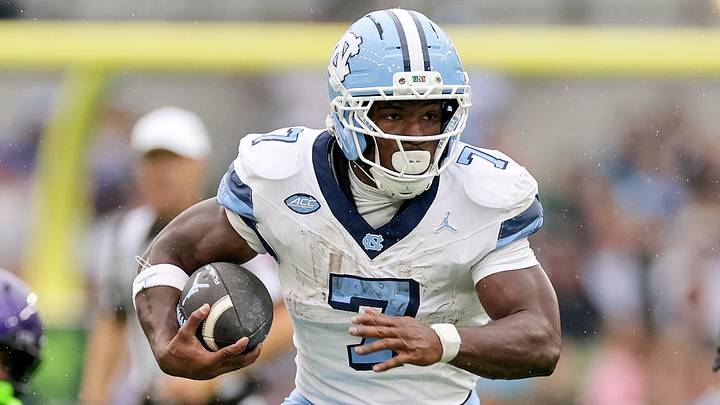Aug 29, 2026; Dublin, Co. Dublin, IRL; North Carolina Tar Heels running back Benjamin Hall (7) carries the ball against the TCU Horned Frogs in the first half at Aviva Stadium. Mandatory Credit: Laszlo Geczo-Imagn Images
