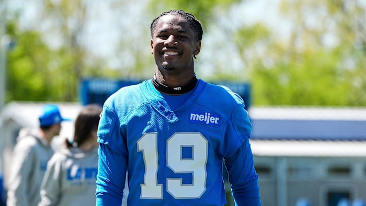 Detroit Lions wide receiver Dominic Lovett (19) smiles as he walks off the field after practice during rookie mini camp 