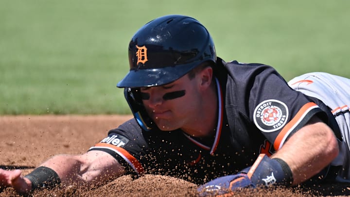 Feb 24, 2026; North Port, Florida, USA; Detroit Tigers shortstop Kevin McGonigle (85) dives back to first base in the first inning against the Atlanta Braves during spring training at CoolToday Park. Mandatory Credit: Jonathan Dyer-Imagn Images Feb 24, 2026; North Port, Florida, USA; Detroit Tigers shortstop Kevin McGonigle (85) dives back to first base in the first inning against the Atlanta Braves during spring training at CoolToday Park. Mandatory Credit: Jonathan Dyer-Imagn Images