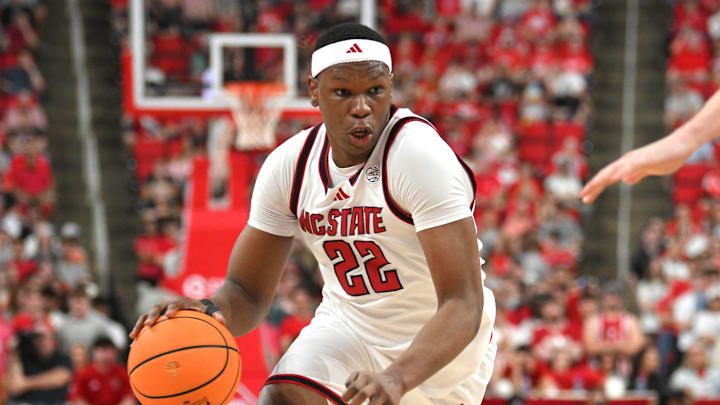 Mar 7, 2026; Raleigh, North Carolina, USA; NC State Wolfpack forward Ven-Allen Lubin (22) drives the ball to the basket against the Stanford Cardinal during the first half at Lenovo Center. Mandatory Credit: Zachary Taft-Imagn Images Mar 7, 2026; Raleigh, North Carolina, USA; NC State Wolfpack forward Ven-Allen Lubin (22) drives the ball to the basket against the Stanford Cardinal during the first half at Lenovo Center. Mandatory Credit: Zachary Taft-Imagn Images