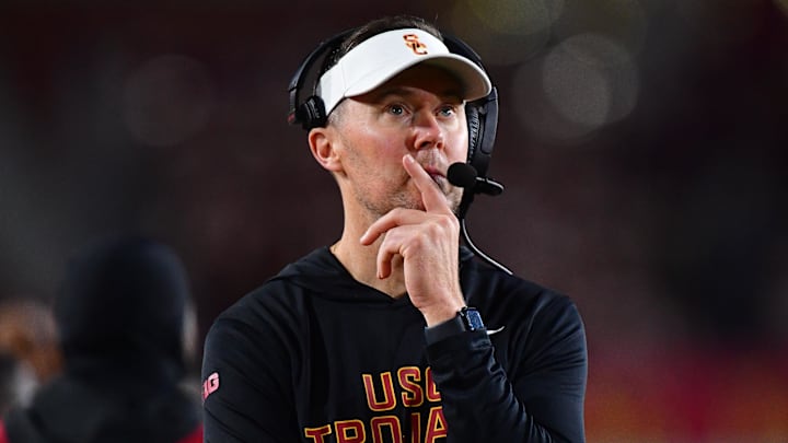 Nov 7, 2025; Los Angeles, California, USA; Southern California Trojans head coach Lincoln Riley watches game action against the Northwestern Wildcats during the second half at the Los Angeles Memorial Coliseum. Mandatory Credit: Gary A. Vasquez-Imagn Images