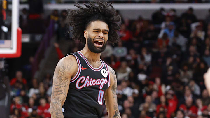 Jan 24, 2026; Chicago, Illinois, USA; Chicago Bulls guard Coby White (0) reacts after scoring against the Boston Celtics during the first half at United Center. Mandatory Credit: Kamil Krzaczynski-Imagn Images