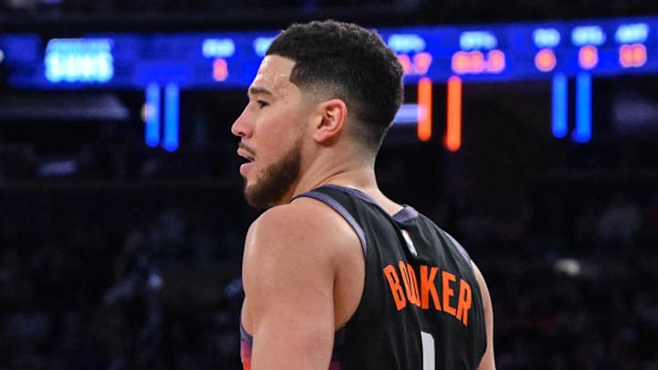Jan 17, 2026; New York, New York, USA; Phoenix Suns guard Devin Booker (1) sets the play during the second half  against the New York Knicks at Madison Square Garden. Mandatory Credit: John Jones-Imagn Images