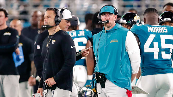 Aug 9, 2025; Jacksonville, Florida, USA; Jacksonville Jaguars defensive coordinator Anthony Campanile stands with head coach Liam Coen on the sidelines during a preseason game against the Pittsburgh Steelers at EverBank Stadium. Mandatory Credit: Travis Register-Imagn Images