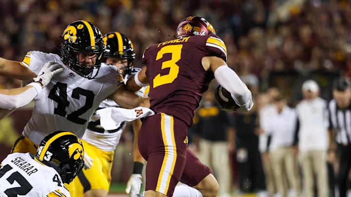 Sep 21, 2024; Minneapolis, Minnesota, US; Minnesota Golden Gophers defensive back Koi Perich (3) returns a kick during the second half against the Iowa Hawkeyes at Huntington Bank Stadium. Mandatory Credit: Matt Krohn-Imagn Images Sep 21, 2024; Minneapolis, Minnesota, US; Minnesota Golden Gophers defensive back Koi Perich (3) returns a kick during the second half against the Iowa Hawkeyes at Huntington Bank Stadium. Mandatory Credit: Matt Krohn-Imagn Images
