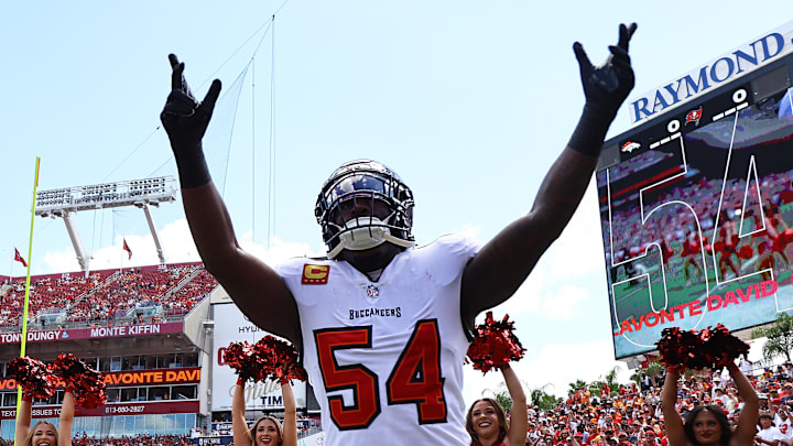 Sep 22, 2024; Tampa, Florida, USA; Tampa Bay Buccaneers linebacker Lavonte David (54) runs out of the tunnel as he is introduced before the game against the Denver Broncos at Raymond James Stadium. Mandatory Credit: Kim Klement Neitzel-Imagn Images